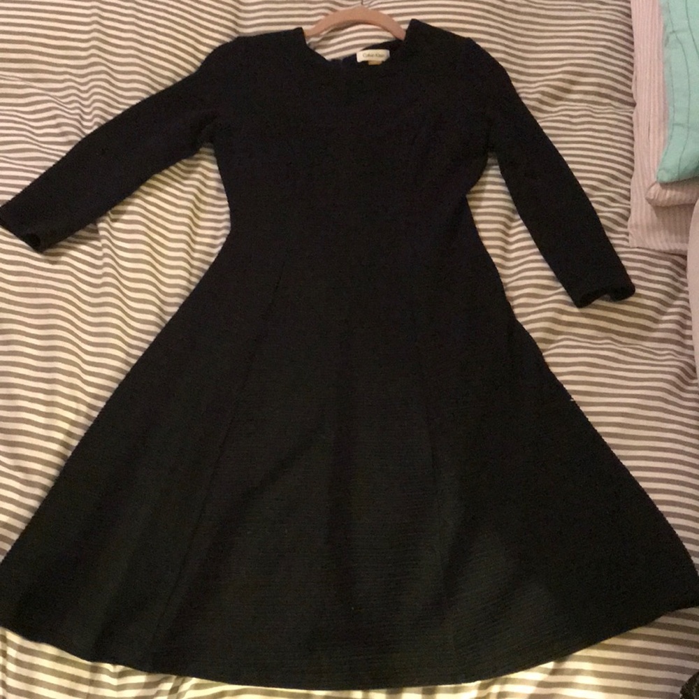 Classic baby doll Calvin Klein black dress.